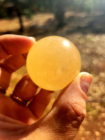 Honey calcite sphere