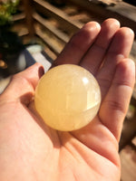 Honey calcite sphere