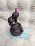 Triple cauldron backflow burner