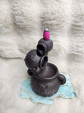 Triple cauldron backflow burner