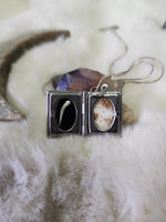 Diamond back rattlesnake fang locket