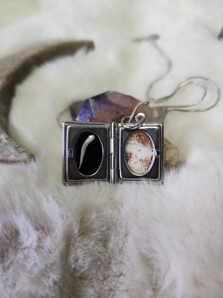 Diamond back rattlesnake fang locket