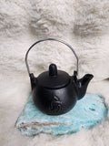 Triquetra cast iron kettle