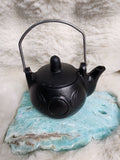 Triple moon cast iron kettle