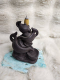 Magic lamp back flow burner