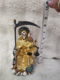 Sante muerte gold cloak statue