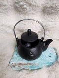 Triquetra cast iron kettle